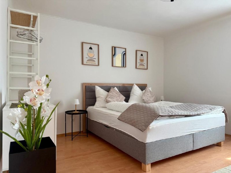 Schlafzimmer mit Orchidee Apartment D01